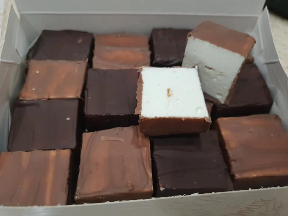 Candies "Bird's milk" in chocolate